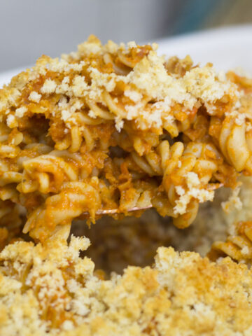 vegan lentil and tomato pasta bake with crunchy topping