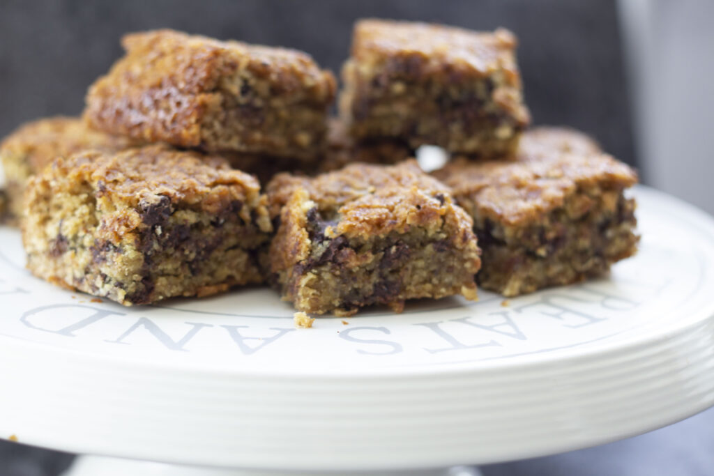 Fudgy Chocolate Chip Vegan Blondies Recipe 196 a plate of vegan blondies