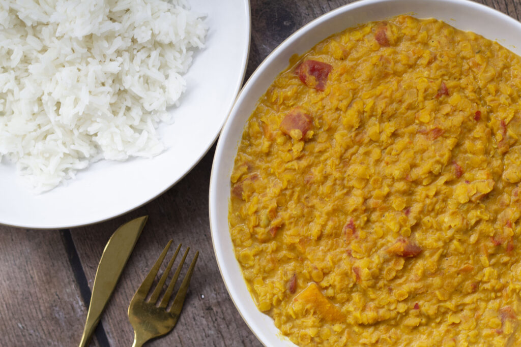 Vegan Red Lentil Dahl Recipe (with coconut milk) 234 Vegan red lentil dahl with coconut milk served with white basmati rice