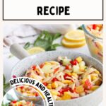 Bowl of vibrant rainbow orzo salad with fresh vegetables and lemon slices in the background. Text on the image reads "Vegan Rainbow Orzo Salad Recipe.