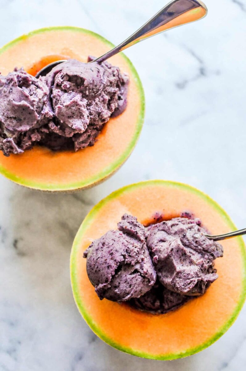 30 Delicious Vegan Blueberry Dessert Recipes 12 Vegan blueberry ice cream served inside two cantaloupe halves.