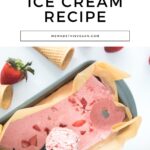 A tray of creamy vegan strawberry ice cream with a scoop placed on top, surrounded by ice cream cones and fresh strawberries. Text above reads, "Vegan Strawberry Ice Cream Recipe.