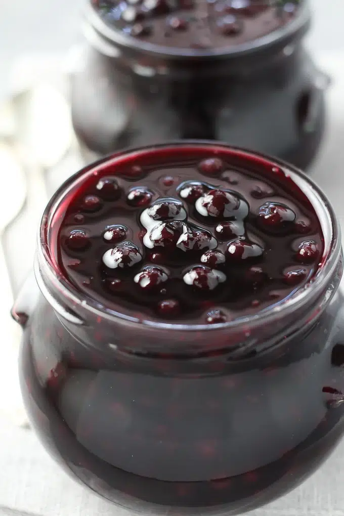 30 Delicious Vegan Blueberry Dessert Recipes 33 Jar of homemade vegan blueberry sauce.