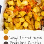 A dish of crispy roasted vegan breakfast potatoes with red and yellow bell peppers, featuring a handwritten label beneath describing the vegan breakfast potatoes.