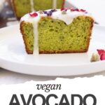 A slice of vegan avocado cake with lemon icing and flower petals on top, served on a white plate—an irresistible treat from our favorite vegan cake recipe.