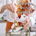 Person in a white shirt and orange trousers stirring a bowl of white mixture with a wooden spoon; text overlay reads “Best Vegan Desserts and Cookbooks.”.